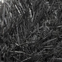 Seto artificial Graphite de alta ocultación en color gris antracita, compuesto por fibras resistentes y 36 varillas, ideal para aportar privacidad y elegancia a jardines, terrazas y balcones urbanos. Resistente a UV, altas temperaturas y lluvia.