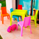 Conjunto Infantil Julieta con mesa verde lima y 4 sillas multicolor para niños.